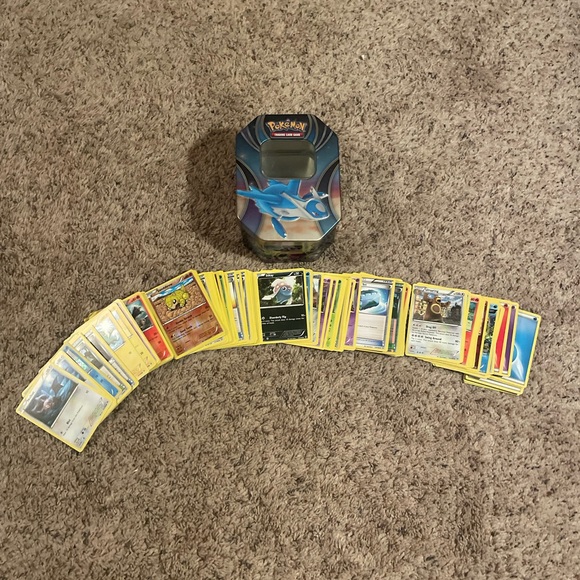 Lot of 182 Pokémon Cards and Tin